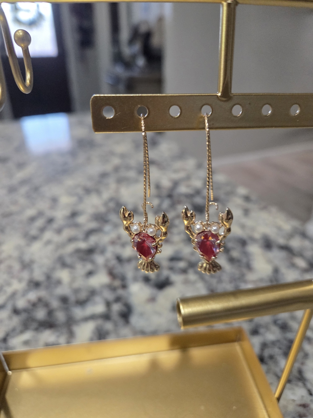 Gold Crab Drop Earrings with Red Gemstones
